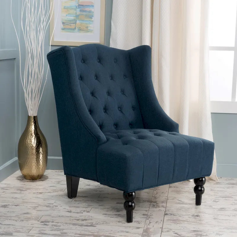 Fauteuil club capitonné à dossier haut avec accoudoirs, surpiqûres à losanges et boutons, argent