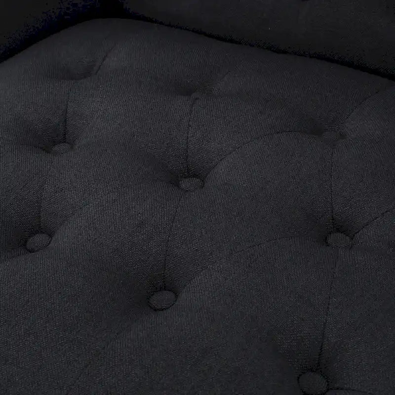 Fauteuil club capitonné à dossier haut avec accoudoirs, surpiqûres à losanges et boutons, argent