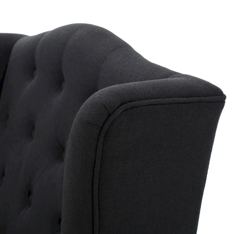 Fauteuil club capitonné à dossier haut avec accoudoirs, surpiqûres à losanges et boutons, argent