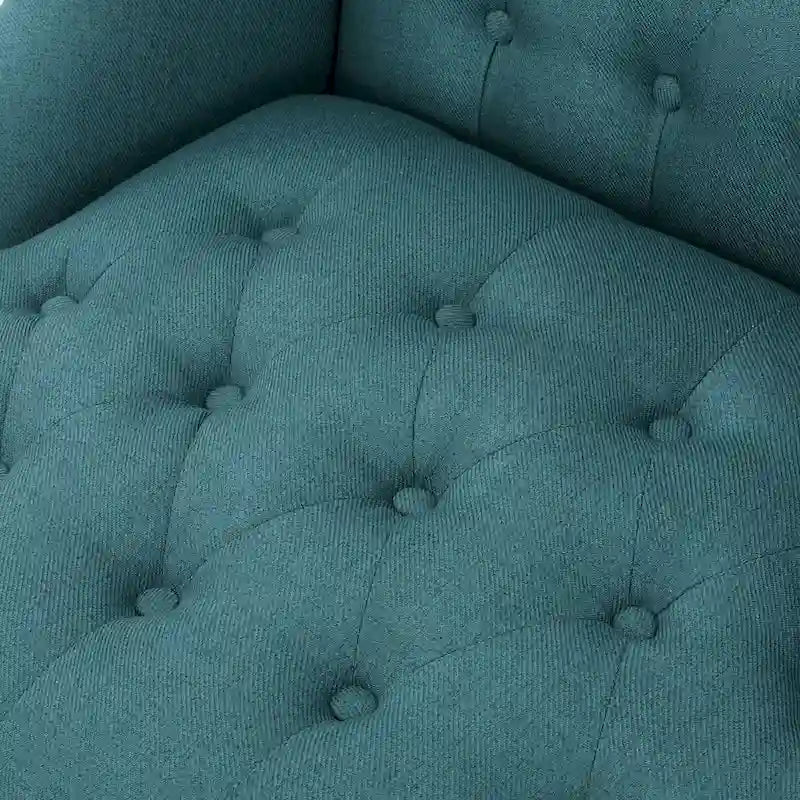 Fauteuil club capitonné à dossier haut avec accoudoirs, surpiqûres à losanges et boutons, argent