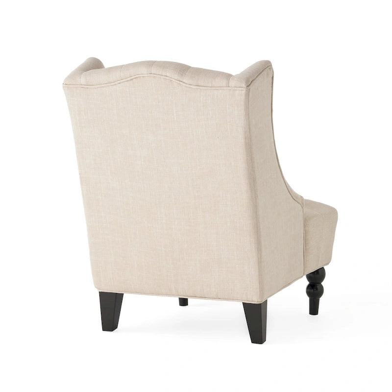 Fauteuil club capitonné à dossier haut avec accoudoirs, surpiqûres à losanges et boutons, argent