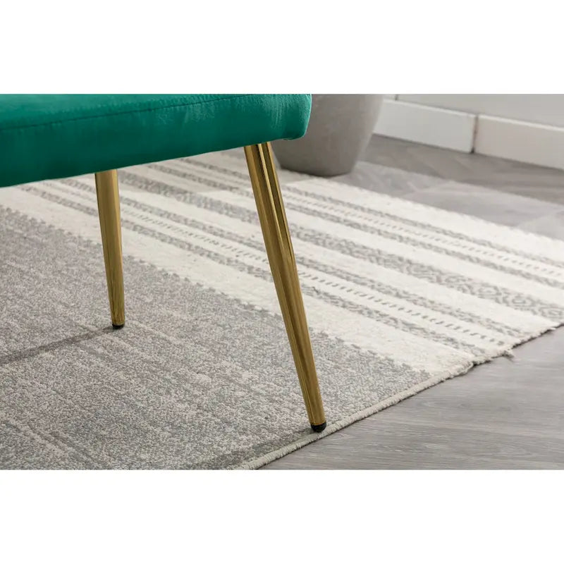 Fauteuil d'appoint en velours capitonné avec accoudoirs et pieds en métal doré